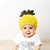The Carmen Pineapple Beanie offers a comfortable fit and features a whimsical pineapple design that is sure to bring a smile to everyone's face.