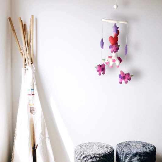 The Global Crafts unicorn mobile is more than just decoration; it's designed to stimulate visual development and provide a soothing, calming effect.
