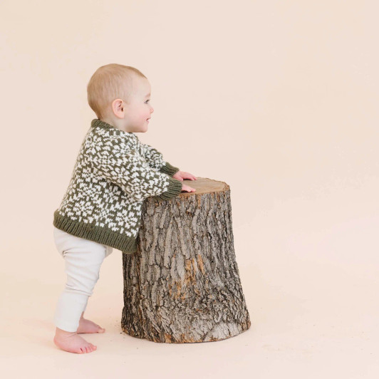 Wrap yourself in the luxurious comfort of the Blueberry Hill Cardigan. This exquisitely crafted piece is a wardrobe essential, perfect for layering over any outfit.