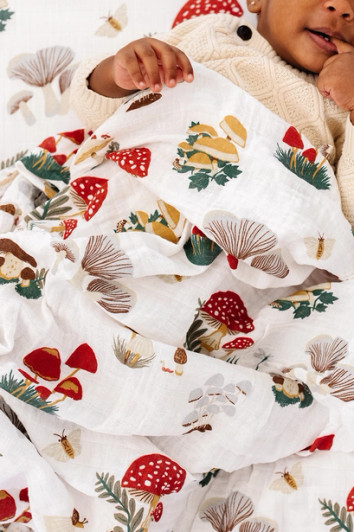 Part of the delightful Clementine Kids collection, this mushroom swaddle is a must-have for any new parent. Give the gift of comfort and style with this essential baby item.
