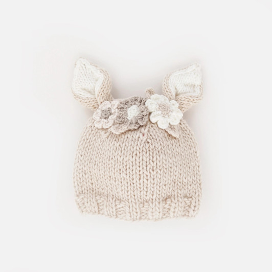 Add a touch of whimsy to your child's wardrobe with this must-have flower beanie. Whether you call it a bunny ear beanie or simply adore its floral accents, this Huggalugs creation is sure to please.