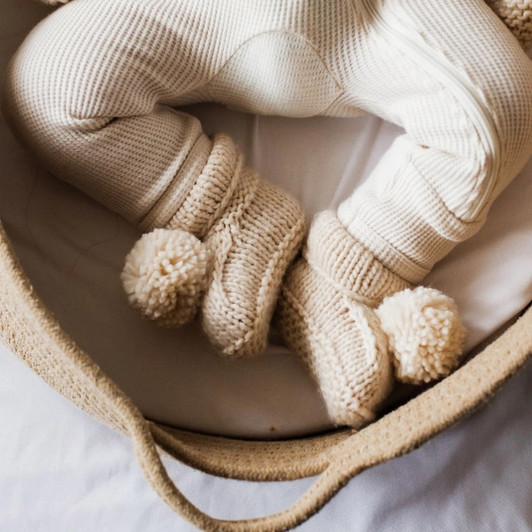 Crafted with care, these knit booties are soft and comfortable for delicate skin. Ideal for newborns and infants, these Huggalugs booties make a wonderful gift for baby showers or any special occasion.