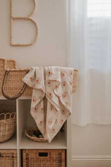 Wrap your little one in the gentle embrace of the Dawn Muslin Swaddle from Brixton Phoenix.