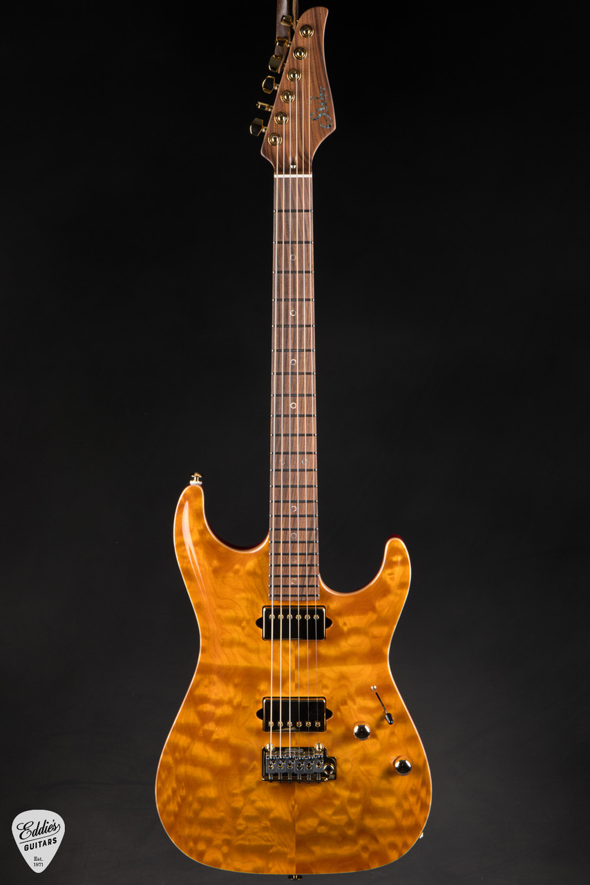 2024 - Suhr Standard Carve Top Pau Ferro Neck - Trans Amber