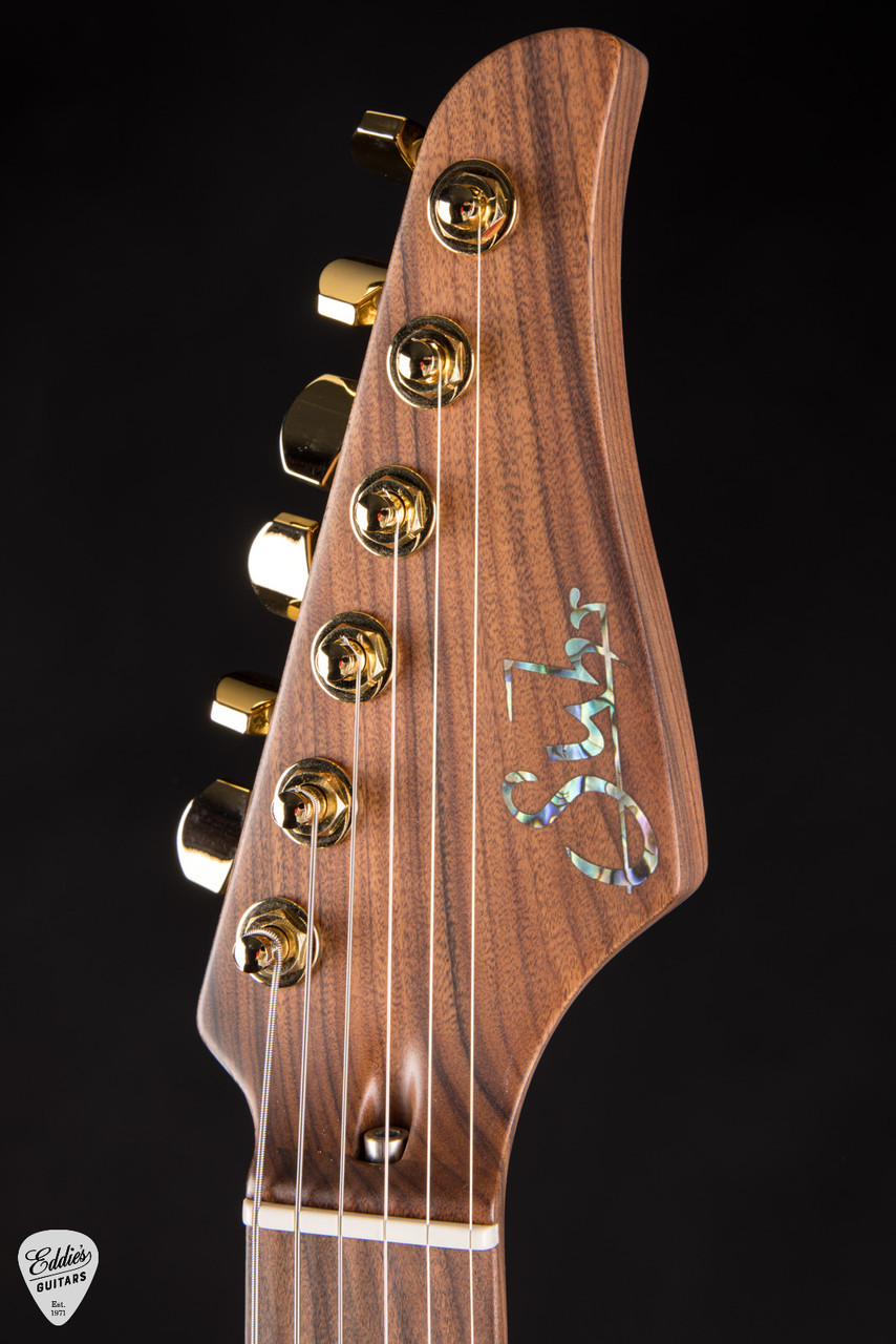 2024 - Suhr Standard Carve Top Pau Ferro Neck - Trans Amber