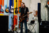 Reb Beach performing at a Guitar Clinic