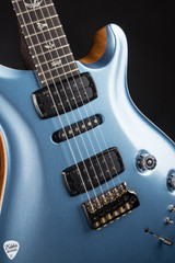 PRS Eddie's Guitars Wood Library Modern Eagle V Rosewood Neck Frost Blue Metallic electric guitar