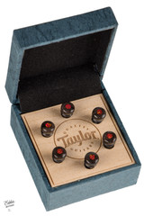 Taylor Custom Water Buffalo Bone Bridge Pins Brown with Red Opal Inlays
