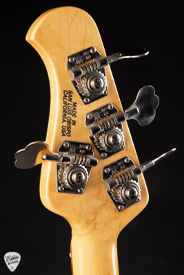 Used – Ernie Ball Music Man Sabre Bass Fire Engine Red bass guitar