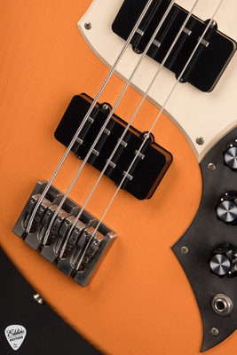 Novo Ivorus Bass Creamsicle electric guitar
