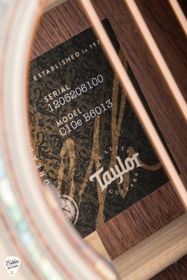 Label for Taylor Custom 13 C10e B6013 Dreadnought Adirondack Spruce and Honduran Rosewood Catch Event NAMM 2026 Acoustic Guitar