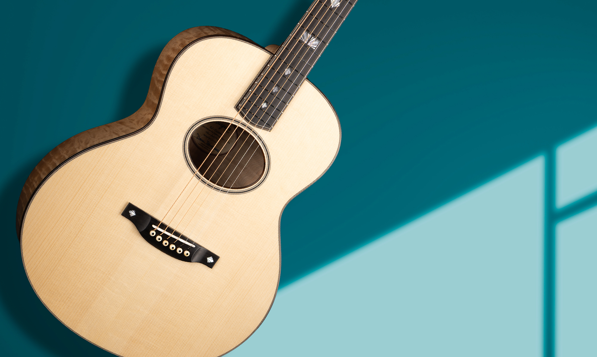 Bourgeois Eddie's Exclusive Carve Back Guitars