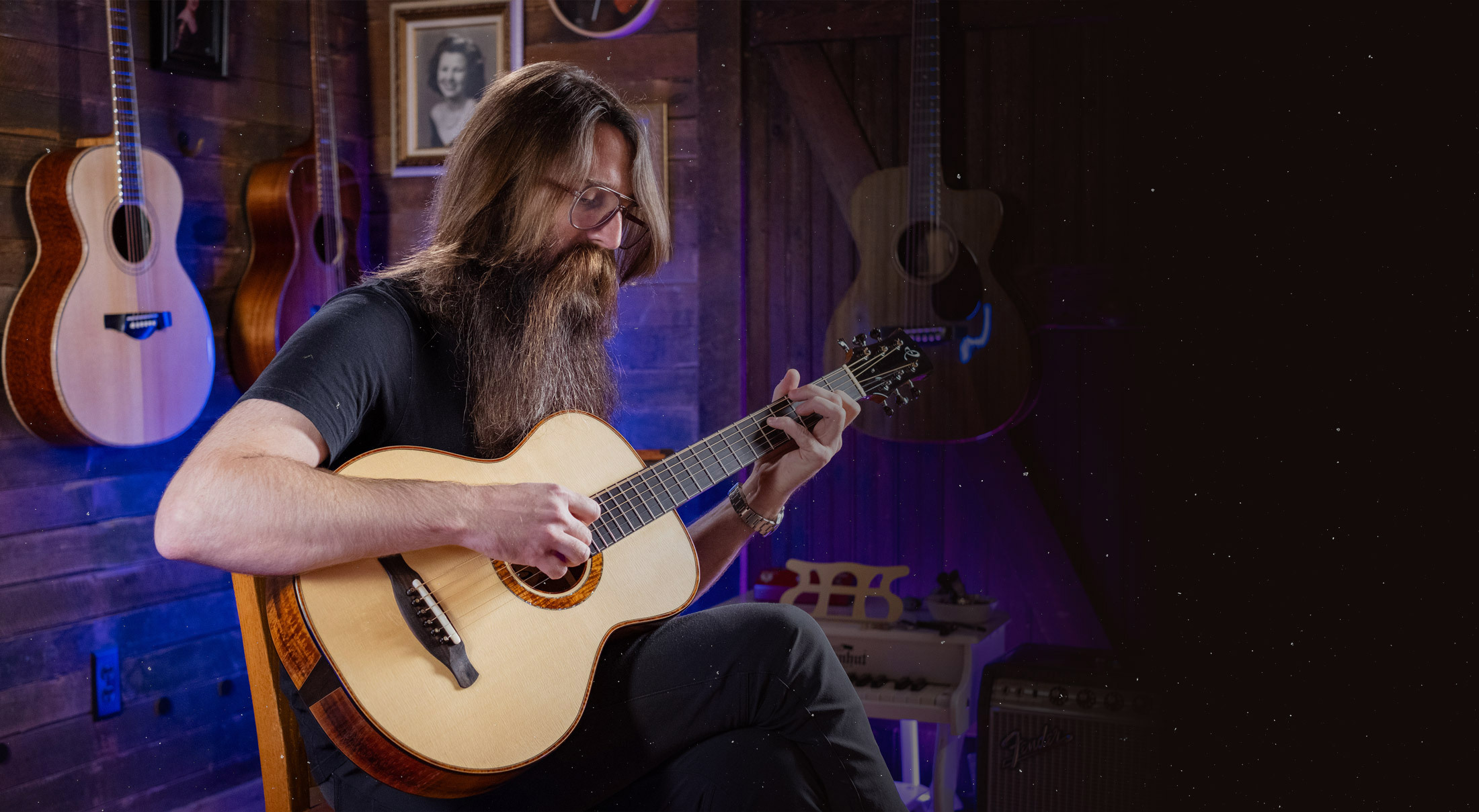 Man Playing Acoustic Guitar in Studio