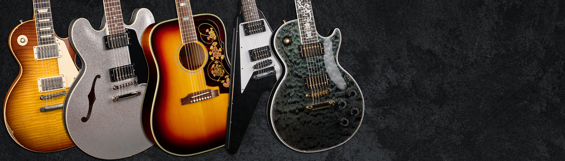 A Group of Gibson Guitars