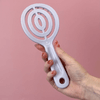 Hapi So Clean Scalp Shampoo Brush, Hapi Shampoo Brush produces a So Clean Scalp. Designed to remove scalp buildup and impurities, as well as gently massage the head, this unique brush is a must for scalp care and health, in hand, animated gif