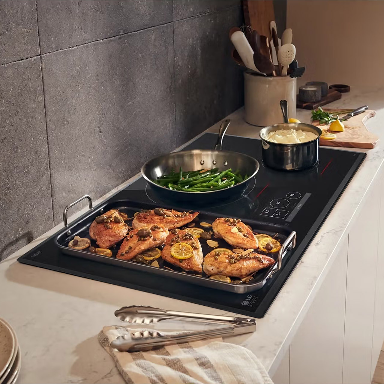 cooktop with chicken and green beans cooking