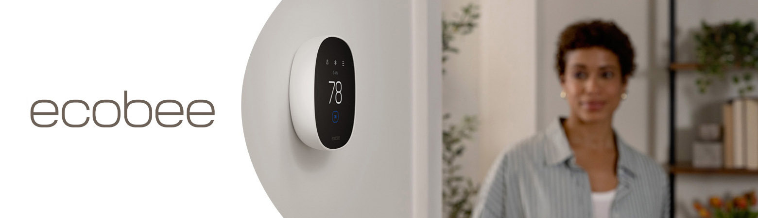 woman walking towards ecobee thermostat that is set to 78 degrees cooling.