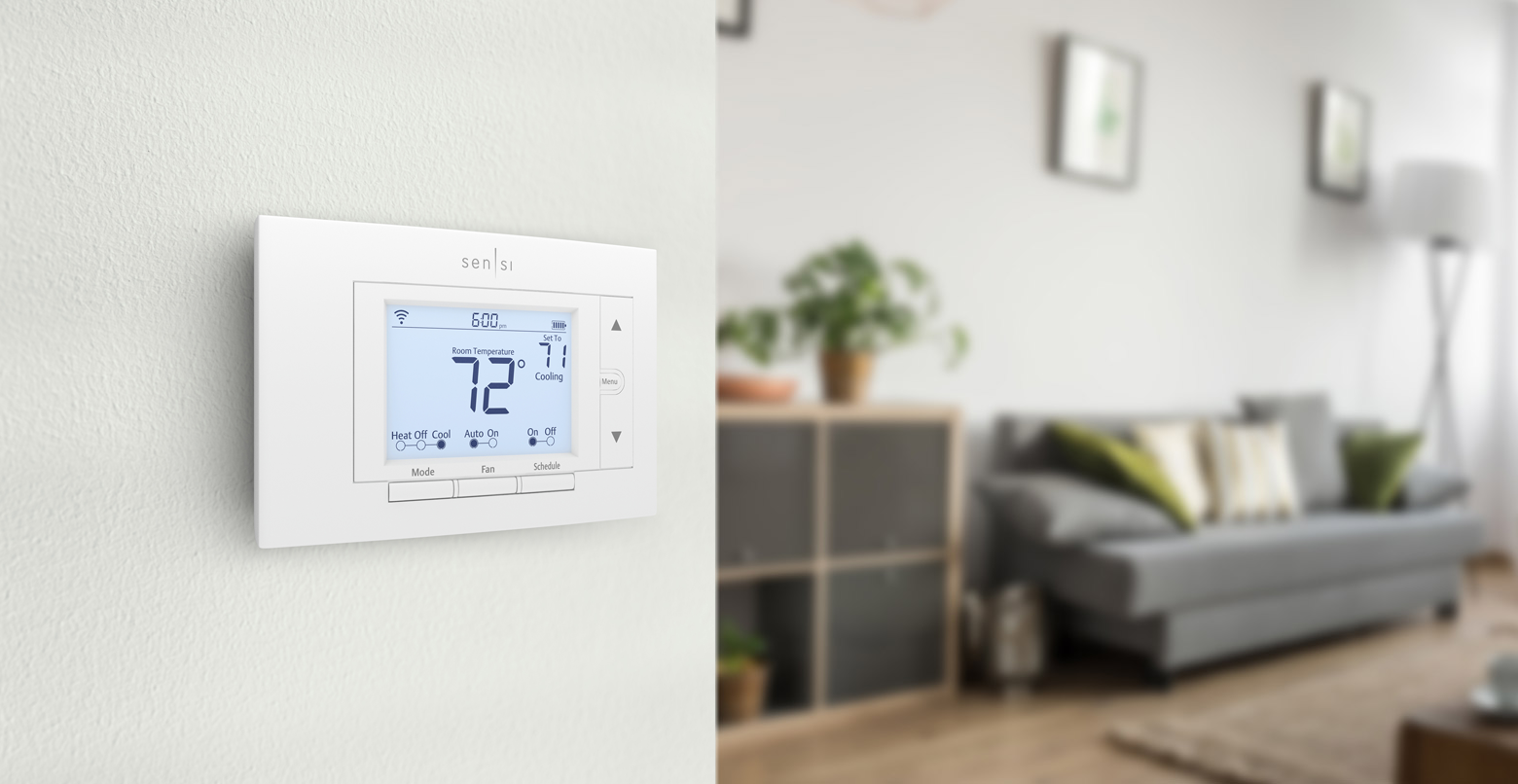 The Sensi install on wall in a living room