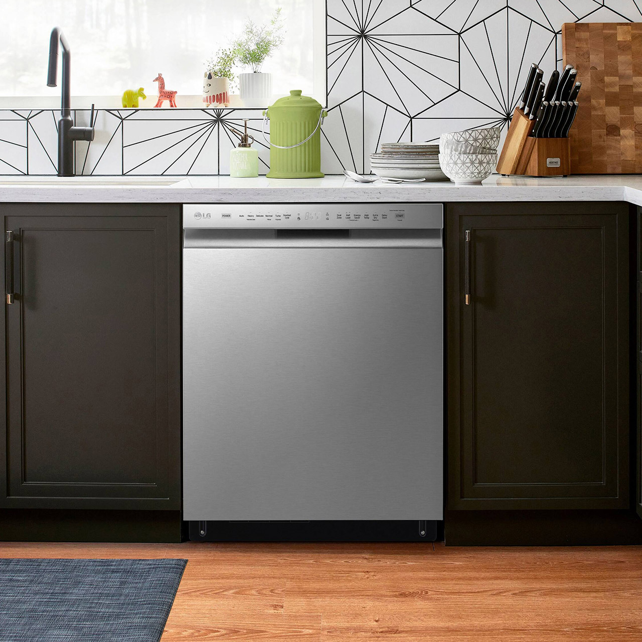 Stainless steel dishwasher installed in wooded counter