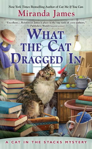 What the Cat Dragged In (Cat in the Stacks Mystery) book cover by Miranda James
