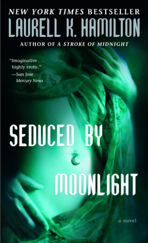 Seduced by Moonlight: A Novel (Merry Gentry) book cover by Laurell K. Hamilton
