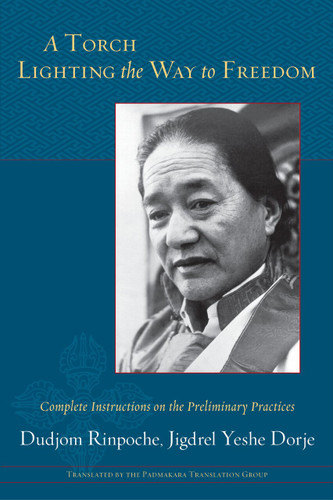 A Torch Lighting the Way to Freedom: Complete Instructions on the Preliminary Practices book cover by Dudjom Rinpoche