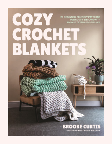 Cozy Crochet Blankets: 20 Beginner-Friendly Patterns for Comfy Throws with Unique Textured Stitches book cover by Brooke Curtis