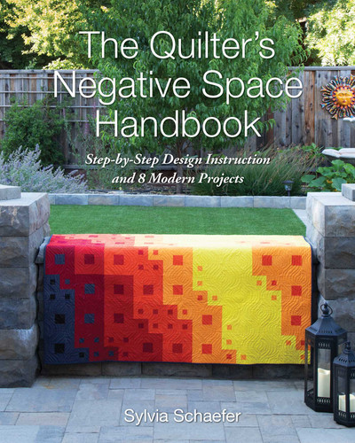 The Quilter's Negative Space Handbook: Step-by-Step Design Instruction and 8 Modern Projects book cover by Sylvia Schaefer