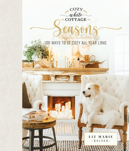 Cozy White Cottage Seasons: 100 Ways to Be Cozy All Year Long (The Perfect Gift for People Who Love Interior Design, Decorating, DIY, Crafting, and Creating Inviting Spaces at Home) (Cozy White Cottage) book cover by Liz Marie Galvan