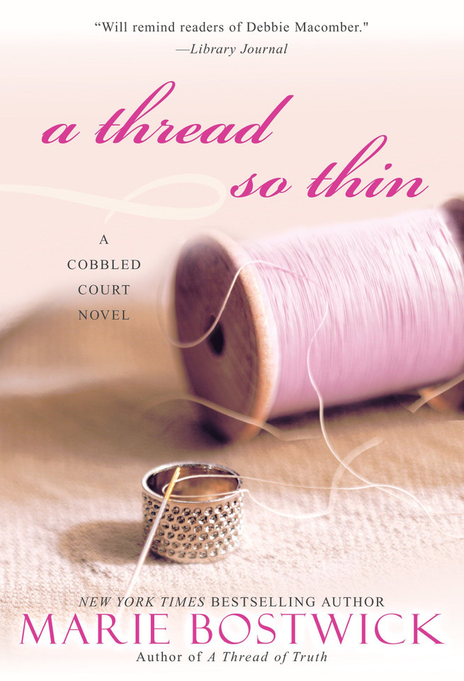 A Thread So Thin (Cobbled Court Quilts) book cover by Marie Bostwick
