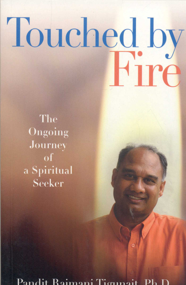 Touched by Fire book cover by Pandit Rajmani Tigunait