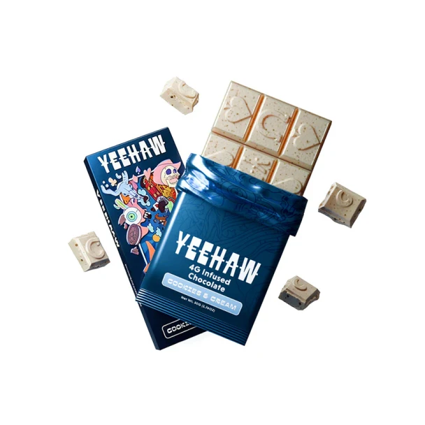 Product Description - COOKIES & CREAM
*Warm Weather Shipping Notice
Dust off your boots and get ready to ride. YEEHAW isn’t your everyday chocolate. Each bar is powered by our proprietary magic blend, along with a next-gen formulation of cordyceps, kanna, kava, l-theanine, citicoline, theobromine, and more. Experience waves of psychedelic clarity and expanded perception. Your mood lifts, creativity flows, and your senses sharpen as you journey deeper, riding the moment as far as the horizon takes you.

Offered in Milk Chocolate, Cookies & Cream, and Strawberry Milk, delivering a flavorful and euphoric way to step into your mind’s frontier. This bar is made for the bold explorer. Let’s ride.
