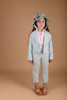 Elasticated strap straw hat for girls with embroidered animal badges and secure chin ties."