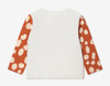 Baby girl wearing a Stella McCartney ivory long sleeve T-shirt adorned with a charming deer motif.