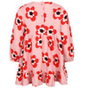 Little girl in a pink long-sleeved dress adorned with red flowers, by Stella McCartney Kids.