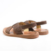 back/side of boy fashion brown Plage Stitch Cross Leather Sandals from POM D'API