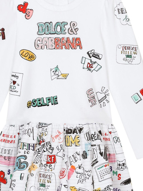 The Smemo-print dress displayed, emphasizing the stretch-cotton material, multicoloured print, and long sleeves design for comfort and style. The Smemo-print dress displayed, emphasizing the stretch-cotton material, multicoloured print, and long sleeves design for comfort and style.