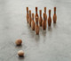 Nature's Play Bowling Balls amidst Wooden Pins