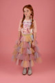 RaspberryPlum's vibrant pink, yellow, and blue tulle skirt, perfect for playful twirls.