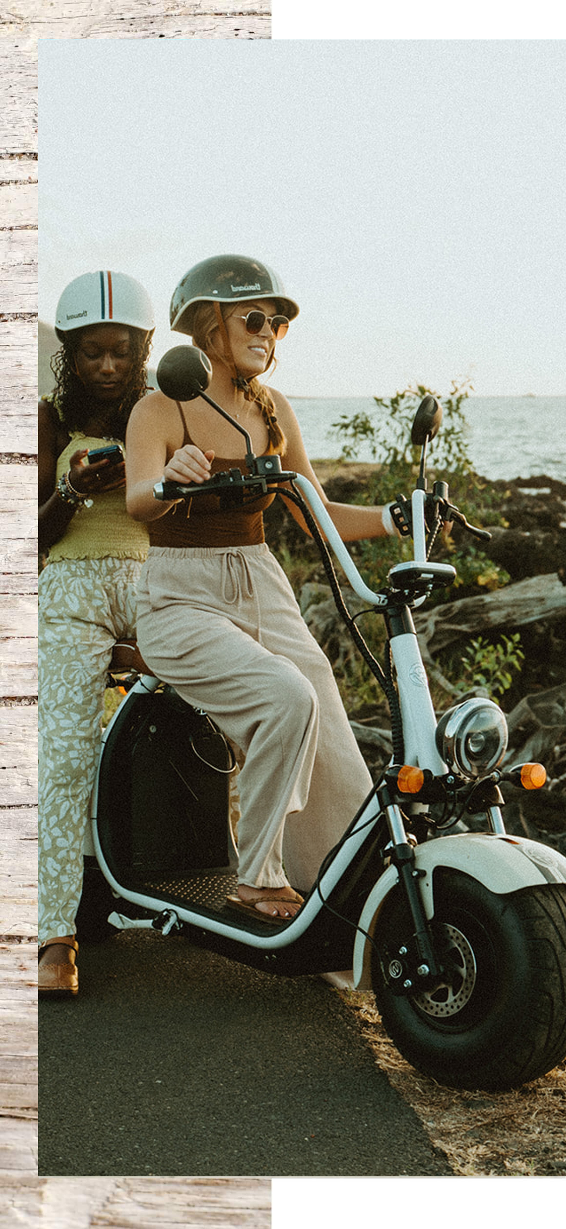 girl riding a cruzer on a beach
