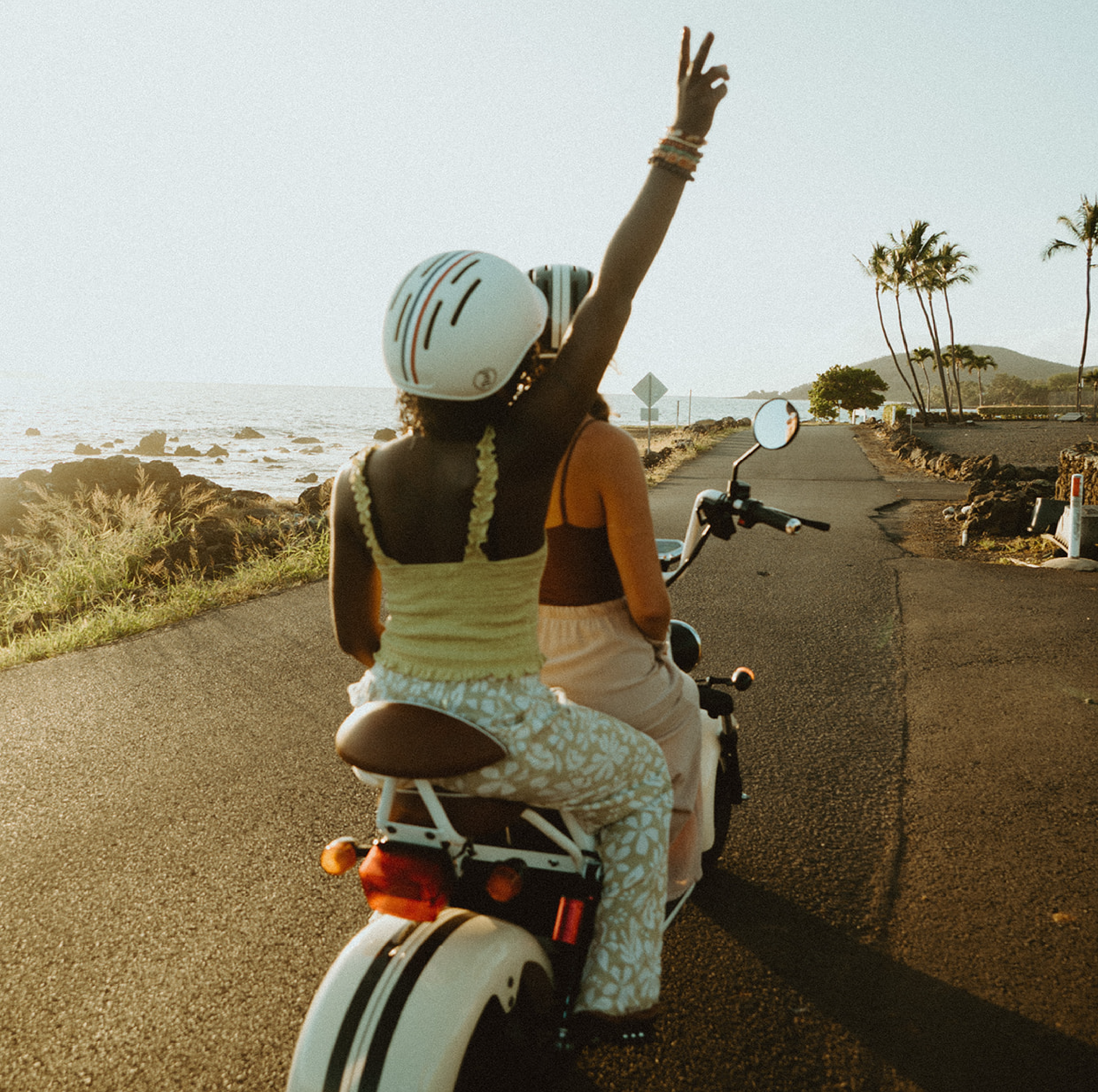 woman riding on island cruzer with orange fenders