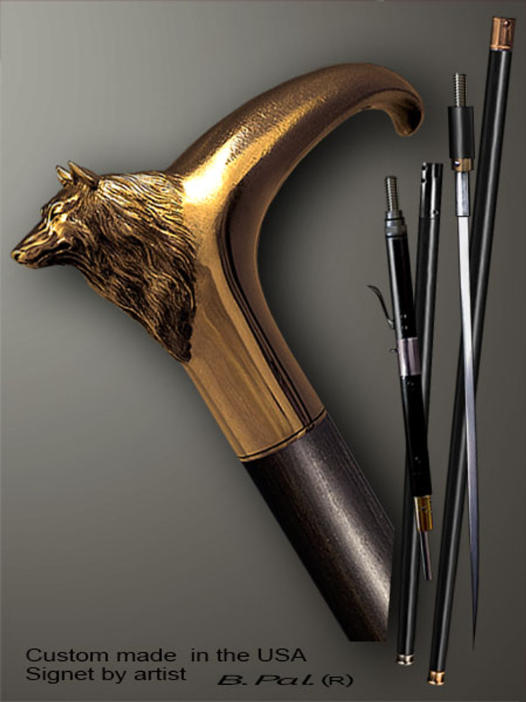 Designer walking cane Wolf is created and produced in the USA. Somebody using a walking stick might want not only physical support, but also some level of collectible or self-defense value. That is why a support walking canes can be done as a sword cane or cane gun. In this case high quality knife or air gun shooting mechanism will be built into the shaft as shown on the picture. Luxury walking sticks handle is cast from bronze and mounted on the ebony or rosewood shaft. Custom version can be finished with natural gems. 