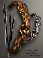 Custom walking cane Mermaid is created and produced in the USA. Somebody using a walking stick might want not only physical support, but also some level of collectible or self-defense value. That is why a support walking canes can be done as a sword cane or cane gun. In this case high quality knife or air gun shooting mechanism will be built into the shaft as shown on the picture. Handmade walking sticks handle is cast from sterling silver or bronze and mounted on the ebony or rosewood shaft. Custom version can be finished with 24K Gold trim. 