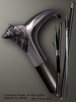 Handmade walking cane Wolf is created and produced in the USA. Custom walking sticks handle is cast from sterling silver mounted on the ebony or rosewood shaft. Custom version can be finished with natural gems. Somebody using a walking stick might want not only physical support, but also some level of collectible or self-defense value. That is why a support walking canes can be done as a sword cane or cane gun. In this case high quality knife or air gun shooting mechanism will be built into the shaft as shown on the picture.  