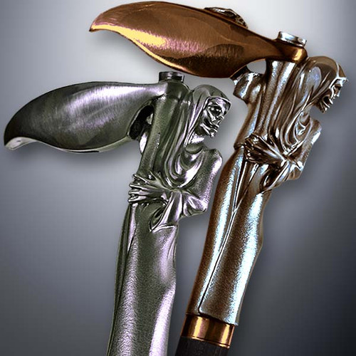 Artistic walking cane Grim reaper design is created and produced in the USA. Handmade walking canes handles are cast from Sterling silver and mounted on an exotic wood shaft. The luxury walking canes version will be completed with 24K Gold plating trim and natural gems by customer request. Somebody using a walking stick might want not only physical support, but also some level of decorative and aesthetic value. Nevertheless, while considering the aesthetics of the walking cane it is important to remember that the comfort, physical stability and security of the walking canes should also be given priority. Functional support walking canes can be requested as a beautiful anniversary gift.