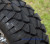 12" VAMPIRE Gloss Black Wheels and 22x10.5-12 STINGER DOT All Terrain Tires Combo - Set of 4
