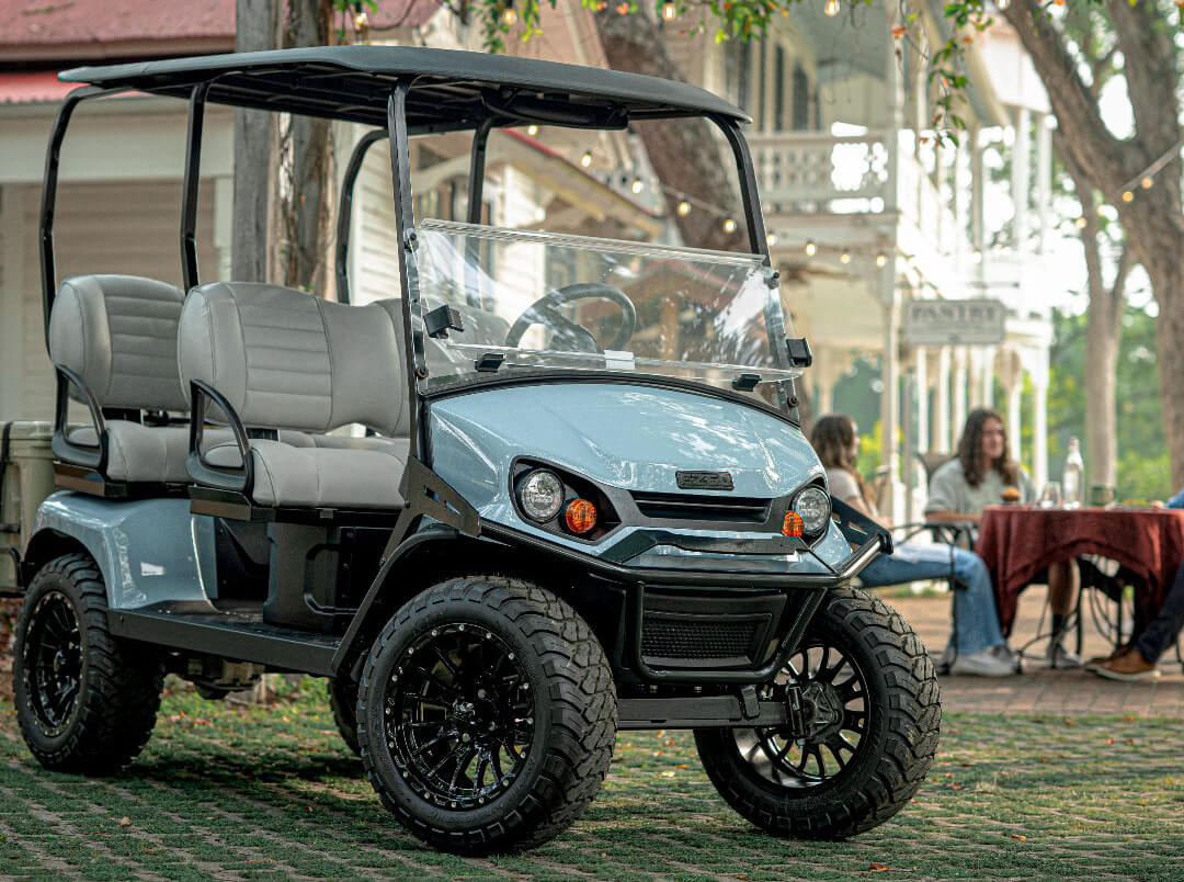 Seafoam Colored 2025 EZGO Liberty Golf Cart with Passengers