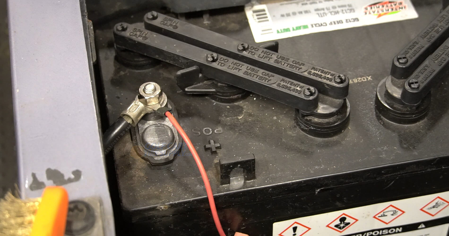 Golf Cart Battery Cables attached to Terminal