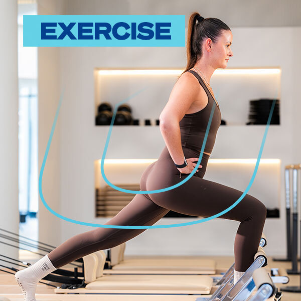 Exercising in Pilates Studio