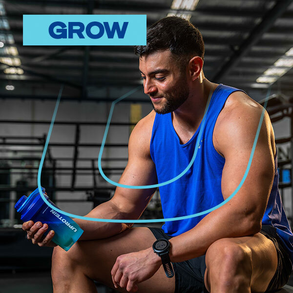 Looking at protien shake in gym